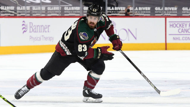 GLENDALE, ARIZONA - APRIL 19: Conor Garland #83 of the Arizona Coyotes skates up ice against the Minnesota Wild at Gila River Arena on April 19, 2021 in Glendale, Arizona.