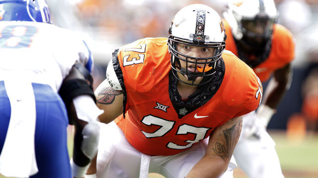 STILLWATER, OK - SEPTEMBER 15: Offensive lineman Teven Jenkins #73 of the Oklahoma State Cowboys looks at the Boise State Broncos defensive line at Boone Pickens Stadium on September 15, 2018 in Stillwater, Oklahoma. The Cowboys defeated the Broncos 44-21.