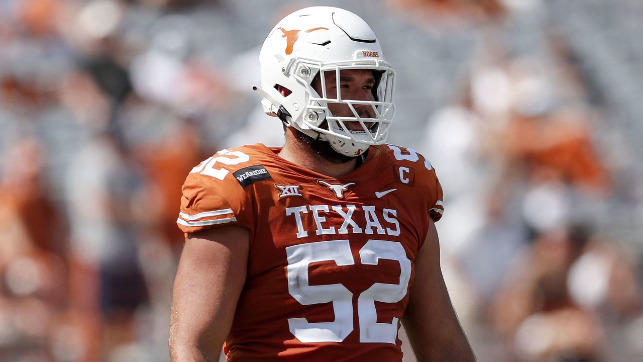 AUSTIN, TEXAS - OCTOBER 03: Samuel Cosmi #52 of the Texas Longhorns takes the field in the fourth quarter against the TCU Horned Frogs at Darrell K Royal-Texas Memorial Stadium on October 03, 2020 in Austin, Texas.
