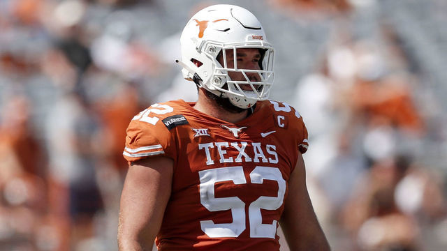 AUSTIN, TEXAS - OCTOBER 03: Samuel Cosmi #52 of the Texas Longhorns takes the field in the fourth quarter against the TCU Horned Frogs at Darrell K Royal-Texas Memorial Stadium on October 03, 2020 in Austin, Texas.