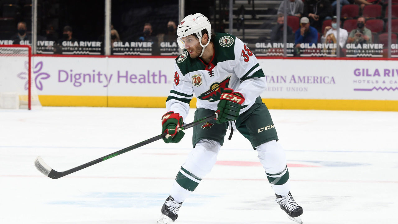 GLENDALE, ARIZONA - APRIL 19: Ryan Hartman #38 of the Minnesota Wild skates up ice against the Arizona Coyotes at Gila River Arena on April 19, 2021 in Glendale, Arizona.