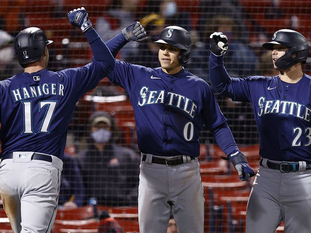 Sam Haggerty of the Seattle Mariners celebrates a run against the