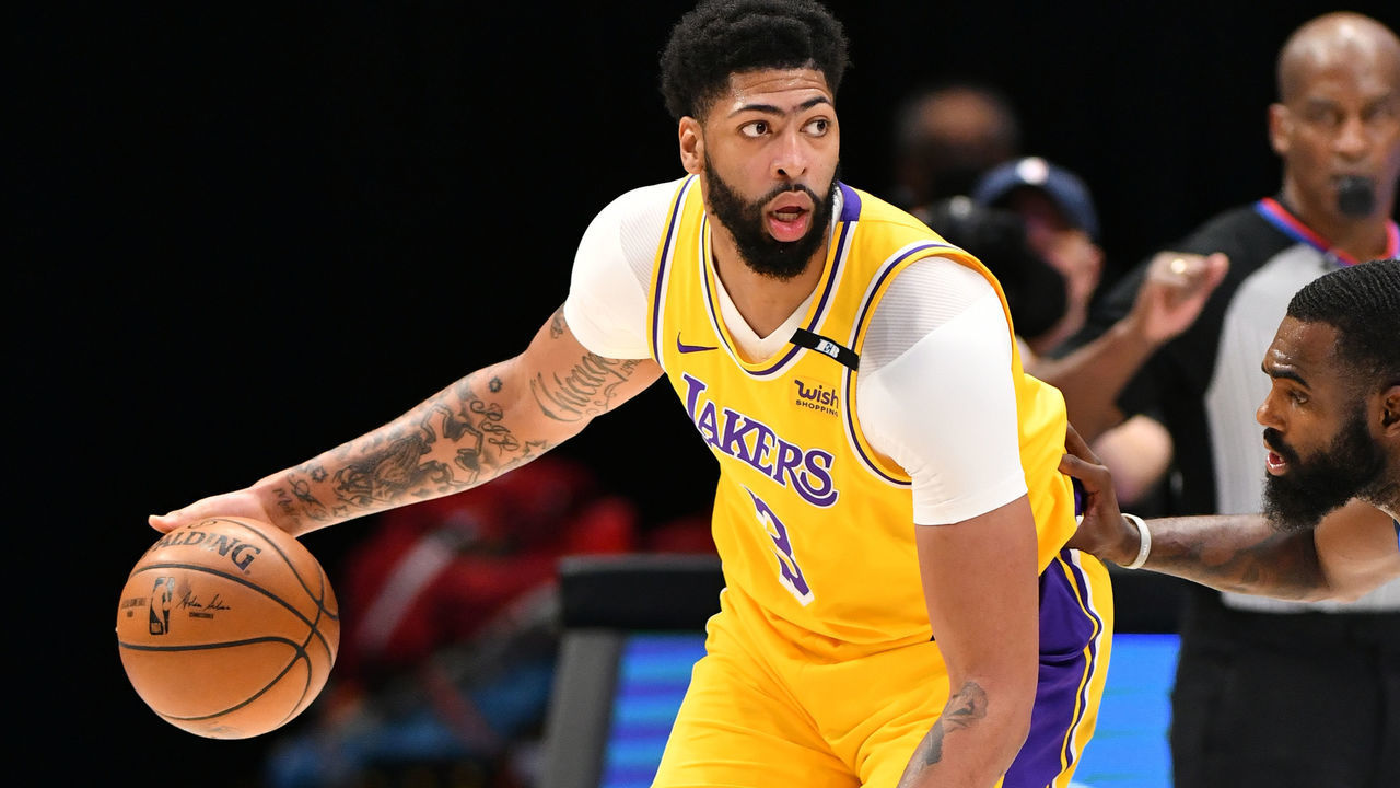 DALLAS, TX - APRIL 22: Anthony Davis #3 of the Los Angeles Lakers handles the ball against the Dallas Mavericks on April 22, 2021 at the American Airlines Center in Dallas, Texas. Mandatory Copyright Notice: Copyright 2021 NBAE