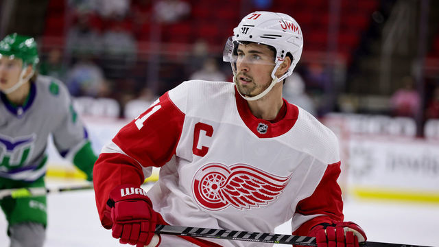 RALEIGH, NC - APRIL 10: Dylan Larkin #71 of the Detroit Red Wings skates for position on the ice during an NHL game against the Carolina Hurricanes on April 10, 2021 at PNC Arena in Raleigh, North Carolina.