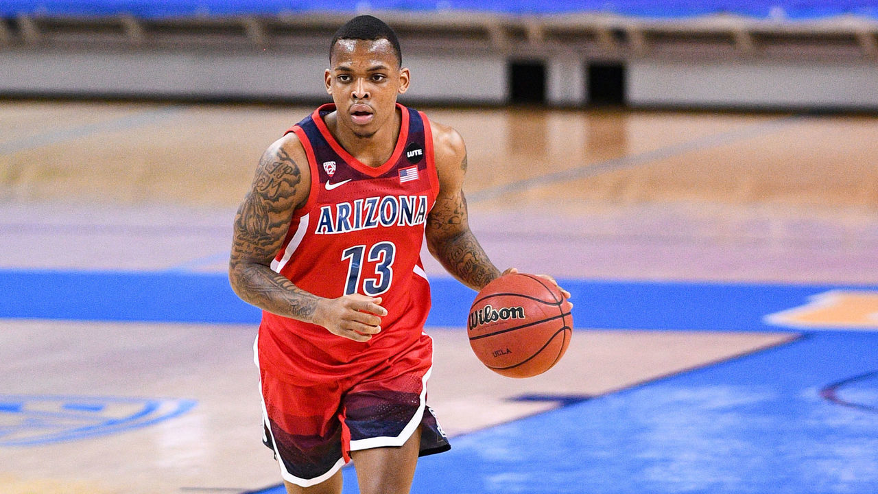 LOS ANGELES, CA - FEBRUARY 18: Arizona Wildcats guard James Akinjo (13) dribbles up the court during a game between the Arizona Wildcats and the UCLA Bruins on February 18, 2021, at Pauley Pavilion in Los Angeles, CA. The game was played without fans due to the COVID-19 pandemic.