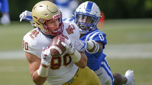 DURHAM, NORTH CAROLINA - SEPTEMBER 19: Boston College Eagles tight end Hunter Long (80 catches a pass against Duke Blue Devils safety Marquis Waters in the fourth quarter at Wallace Wade Stadium on September 19, 2020 in Durham, North Carolina. The Boston College Eagles won 26-6.