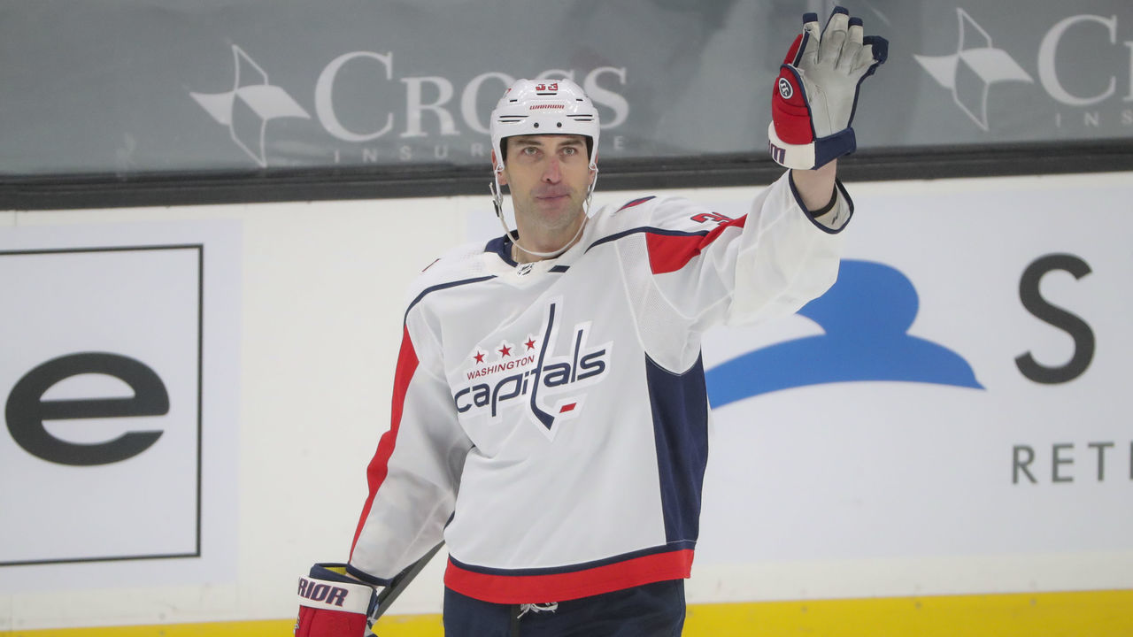 Boston - April 11: Washington Capitals defenseman Zdeno Chara (33) waves to the crowd after a video replay on his Bruins career against the Boston Bruins during first period NHL action. The Boston Bruins host the Washington Capitals at TD Garden in Boston on April 11, 2021.