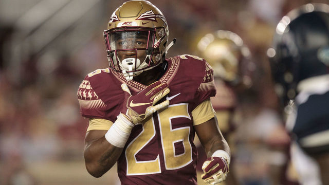 TALLAHASSEE, FL - SEPTEMBER 08: Florida State Seminoles defensive back Asante Samuel Jr. (26) checks with his coaches during the game between the Florida State Seminoles and the Samford Bulldogs at Doak Campbell Stadium in Tallahassee, Florida on September 8th, 2018.