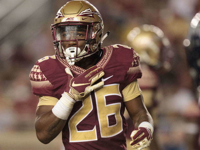 TALLAHASSEE, FL - SEPTEMBER 08: Florida State Seminoles defensive back Asante Samuel Jr. (26) checks with his coaches during the game between the Florida State Seminoles and the Samford Bulldogs at Doak Campbell Stadium in Tallahassee, Florida on September 8th, 2018.