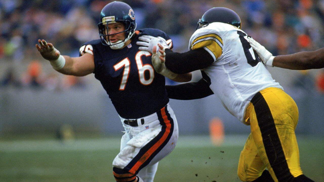 CHICAGO - DECEMBER 13: Steve McMichael #76 of the Chicago Bears looks for the pass during the game against the Pittsburgh Steelers on December 13, 1992 in Chicago, Illinois. The Bears won 30-6.