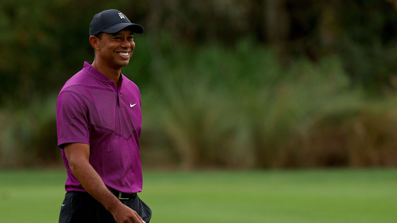 ORLANDO, FLORIDA - DECEMBER 19: Tiger Woods of the United States looks on during the first round of the PNC Championship at the Ritz Carlton Golf Club on December 19, 2020 in Orlando, Florida.