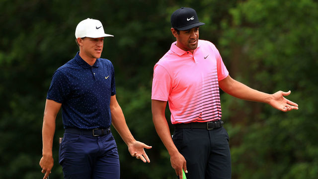 NEW ORLEANS, LOUISIANA - APRIL 23: Tony Finau and Cameron Champ talk over a shot on the fourth green during the second round of the Zurich Classic of New Orleans at TPC Louisiana on April 23, 2021 in New Orleans, Louisiana.