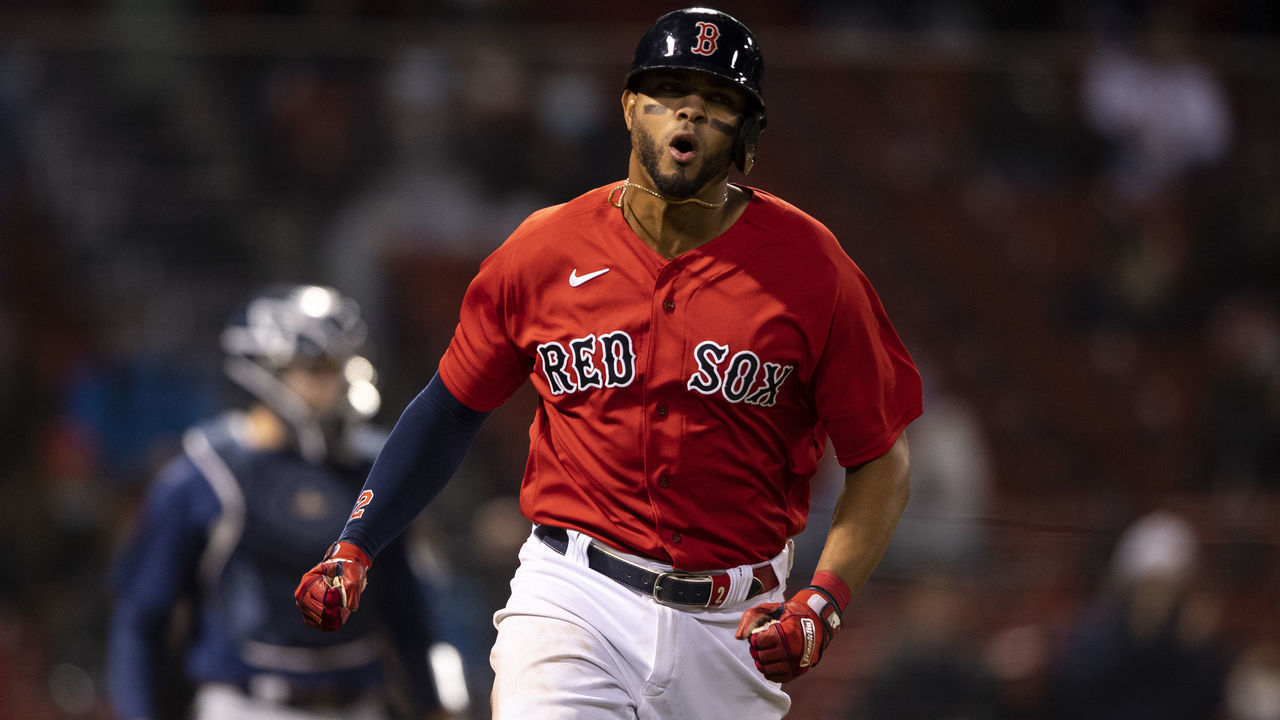 BOSTON, MA - APRIL 23: Xander Bogaerts #2 of the Boston Red Sox reacts after hitting an RBI single during the fifth inning of a game against the Seattle Mariners on April 23, 2021 at Fenway Park in Boston, Massachusetts.