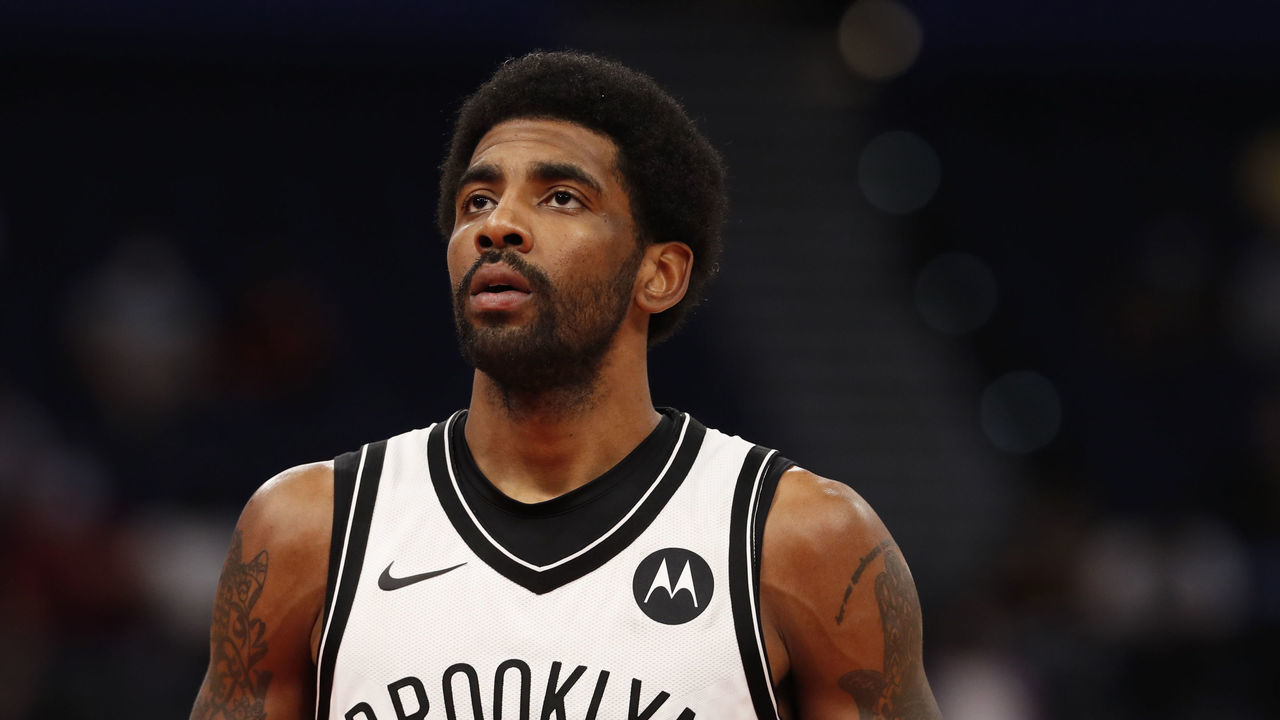 TAMPA, FL- APRIL 21: Kyrie Irving #11 of the Brooklyn Nets shoots a free throw against the Toronto Raptors on April 21, 2021 at Amalie Arena in Tampa, Florida. Mandatory Copyright Notice: Copyright 2021 NBAE