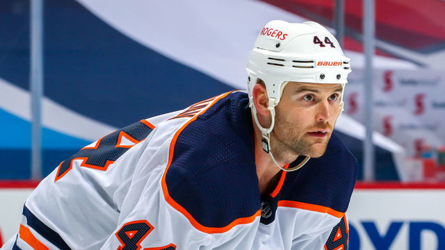 WINNIPEG, MB - APRIL 17: Zack Kassian #44 of the Edmonton Oilers looks on prior to a third period face-off against the Winnipeg Jets at Bell MTS Place on April 17, 2021 in Winnipeg, Manitoba.