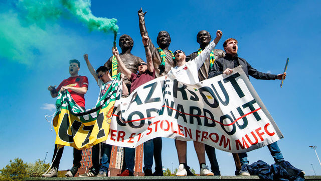 Manchester United fans during a fan protest against the club owners outside of Old Trafford, Manchester. Picture date: Saturday April 24, 2021.
