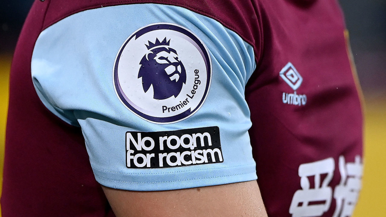 BURNLEY, ENGLAND - FEBRUARY 06: A detailed view of the 'No Room for Racism' and Premier League badges during the Premier League match between Burnley and Brighton & Hove Albion at Turf Moor on February 06, 2021 in Burnley, England. Sporting stadiums around the UK remain under strict restrictions due to the Coronavirus Pandemic as Government social distancing laws prohibit fans inside venues resulting in games being played behind closed doors.