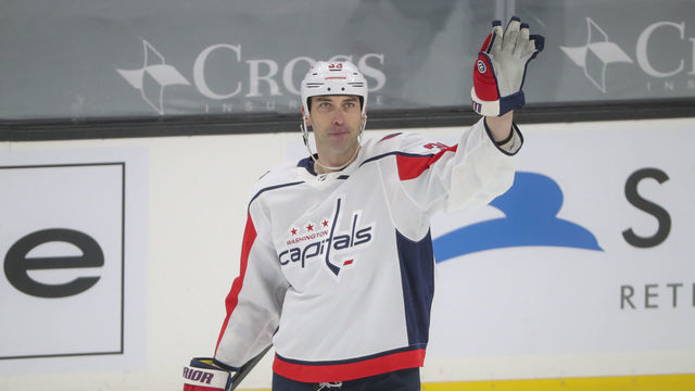 Boston - April 11: Washington Capitals defenseman Zdeno Chara (33) waves to the crowd after a video replay on his Bruins career against the Boston Bruins during first period NHL action. The Boston Bruins host the Washington Capitals at TD Garden in Boston on April 11, 2021.