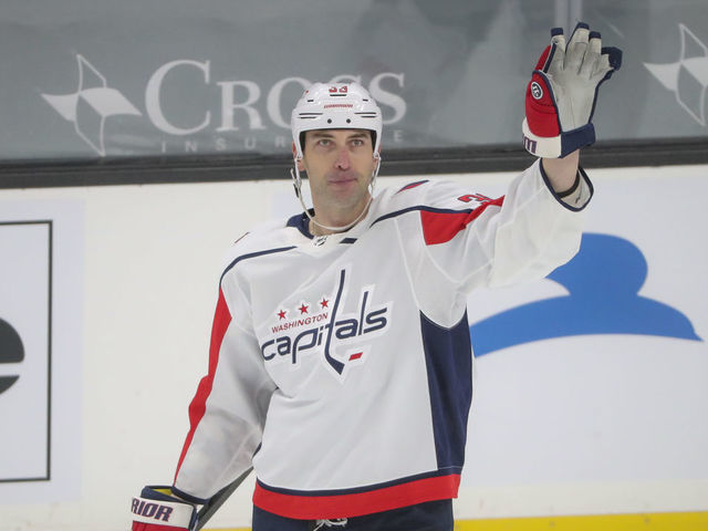 Boston - April 11: Washington Capitals defenseman Zdeno Chara (33) waves to the crowd after a video replay on his Bruins career against the Boston Bruins during first period NHL action. The Boston Bruins host the Washington Capitals at TD Garden in Boston on April 11, 2021.