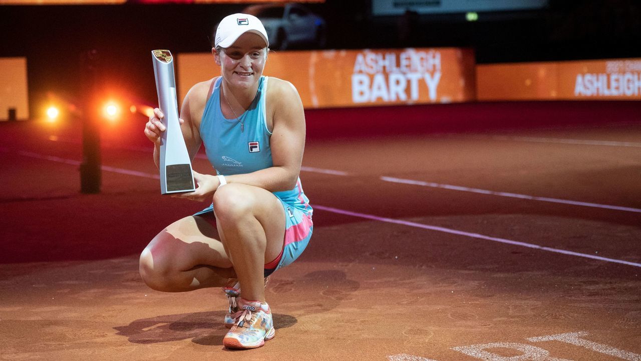 Winner Australia's Ashleigh Barty poses with her trophy after the singles final match against Belarus' Aryna Sabalenka (not in picture) of the Women's Tennis Grand Prix WTA 500 tournament in Stuttgart, southwestern Germany, on April 25, 2021.