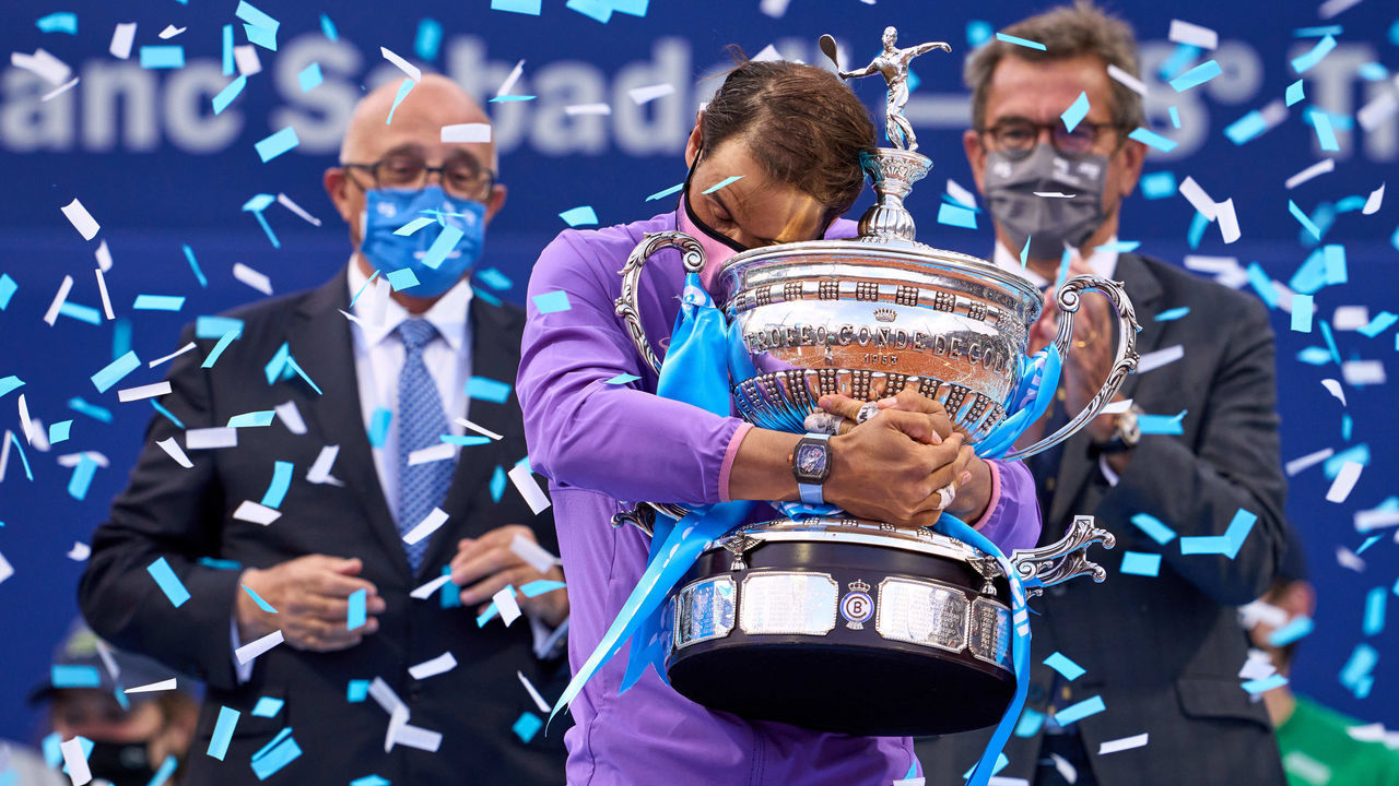 BARCELONA, SPAIN - APRIL 25: Rafael Nadal of Spain lifts the trophy after his victory against Stefanos Tsitsipas of Greece in their final match during day seven of the Barcelona Open Banc Sabadell 2021 at Real Club de Tenis Barcelona on April 25, 2021 in Barcelona, Spain.