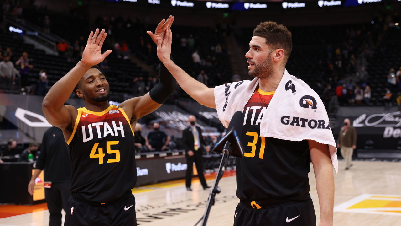 SALT LAKE CITY, UT - APRIL 13: Donovan Mitchell #45 and Georges Niang #31 of the Utah Jazz hi-five after the game against the Oklahoma City Thunder on April 13, 2021 at vivint.SmartHome Arena in Salt Lake City, Utah. Mandatory Copyright Notice: Copyright 2021 NBAE