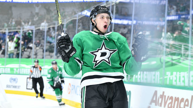 DALLAS, TX - MARCH 25: Jason Robertson #21 of the Dallas Stars celebrates a goal against the Tampa Bay Lightning at the American Airlines Center on March 25, 2021 in Dallas, Texas.