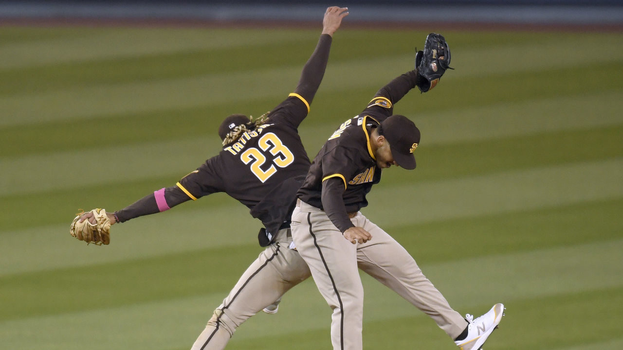 LOS ANGELES, CALIFORNIA - APRIL 25: Fernando Tatis Jr. #23 and Trent Grisham #2 of the San Diego Padres celebrate an 8-7 win over the Los Angeles Dodgers in eleventh innings at Dodger Stadium on April 25, 2021 in Los Angeles, California.