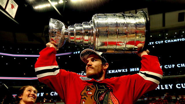 CHICAGO, IL - JUNE 15: Andrew Shaw #65 of the Chicago Blackhawks celebrates with the Stanley Cup after defeating the Tampa Bay Lightning by a score of 2-0 in Game Six to win the 2015 NHL Stanley Cup Final at the United Center on June 15, 2015 in Chicago, Illinois.