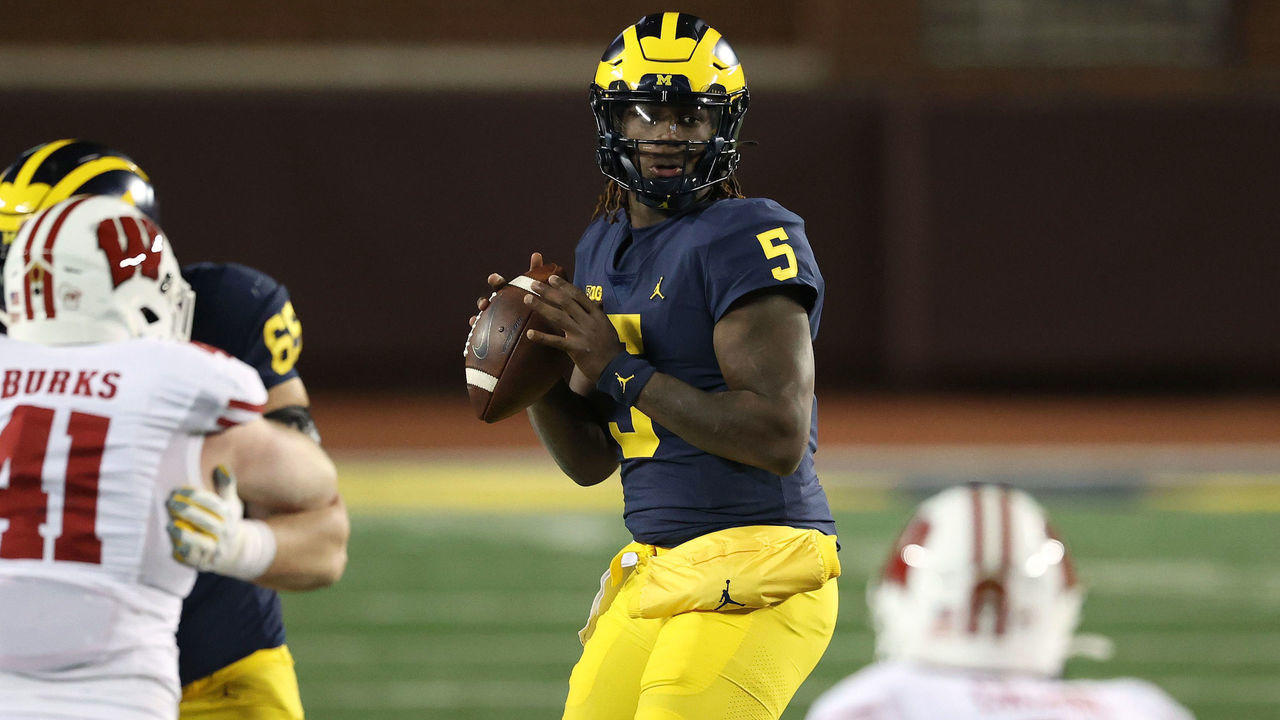 ANN ARBOR, MICHIGAN - NOVEMBER 14: Joe Milton #5 of the Michigan Wolverines looks to throw a first half pass against the Wisconsin Badgers at Michigan Stadium on November 14, 2020 in Ann Arbor, Michigan.