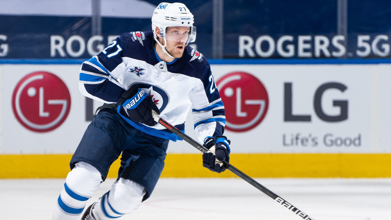 TORONTO, ON - APRIL 15: Nikolaj Ehlers #27 of the Winnipeg Jets skates with the puck against the Toronto Maple Leafs during the first period at the Scotiabank Arena on April 15, 2021 in Toronto, Ontario, Canada.
