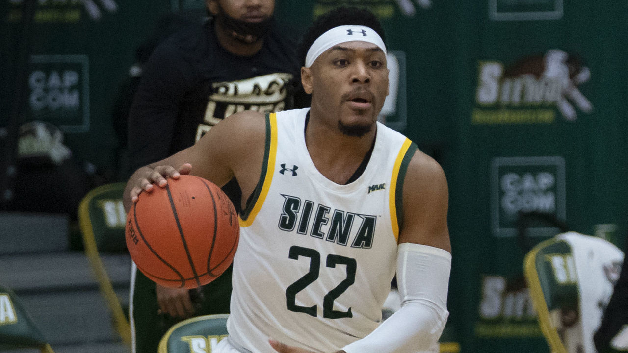 LOUDONVILLE, NY - FEBRUARY 26: Siena Saints Guard Jalen Pickett (22) looks to pass the ball during the College Basketball game between the Manhattan Jaspers and the Siena Saints on February 26, 2021, at Alumni Recreation Center in Loudonville, NY.