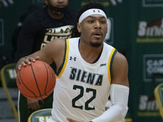 LOUDONVILLE, NY - FEBRUARY 26: Siena Saints Guard Jalen Pickett (22) looks to pass the ball during the College Basketball game between the Manhattan Jaspers and the Siena Saints on February 26, 2021, at Alumni Recreation Center in Loudonville, NY.