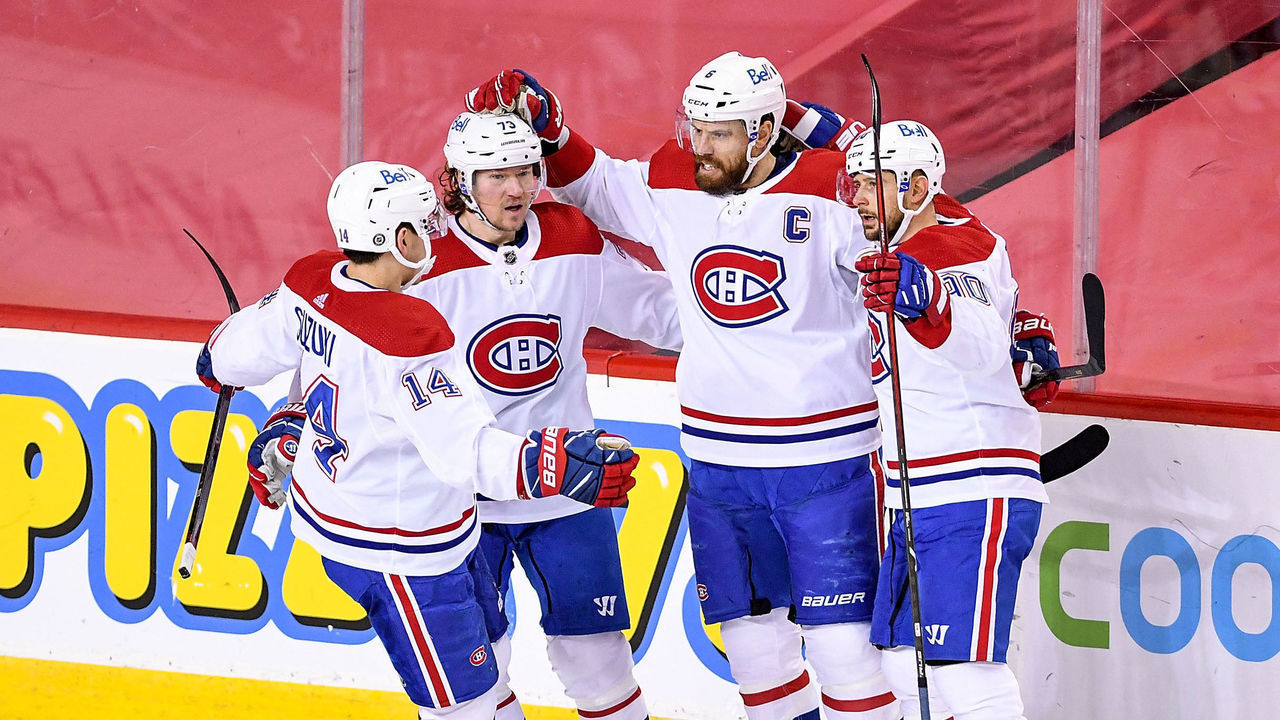 CALGARY, AB - APRIL 26: Montreal Canadiens Defenceman Shea Weber (6) celebrates a goal with Montreal Canadiens Center Nick Suzuki (14), Montreal Canadiens Left Wing Tyler Toffoli (73) and Montreal Canadiens Left Wing Tomas Tatar (90) during the first period of an NHL game where the Calgary Flames hosted the Montreal Canadiens on April 26, 2021, at the Scotiabank Saddledome in Calgary, AB.