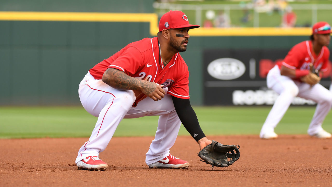 GOODYEAR, ARIZONA - FEBRUARY 28: Christian Colon #29 of the Cincinnati Reds gets ready to make a play against the Oakland Athletics during of a spring training game at Goodyear Ballpark on February 28, 2020 in Goodyear, Arizona.