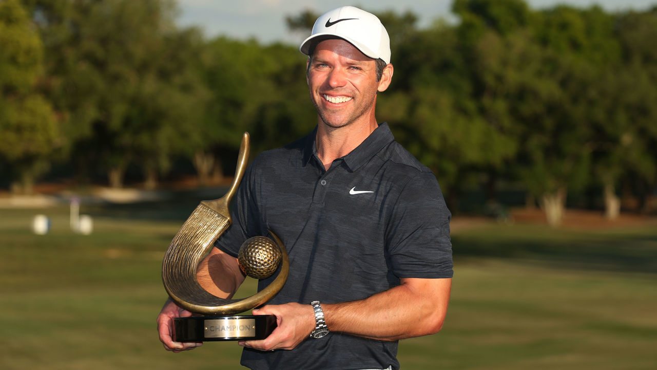 PALM HARBOR, FLORIDA - MARCH 24: Paul Casey of England celebrates with the winner's trophy after the final round of the Valspar Championship on the Copperhead course at Innisbrook Golf Resort on March 24, 2019 in Palm Harbor, Florida.