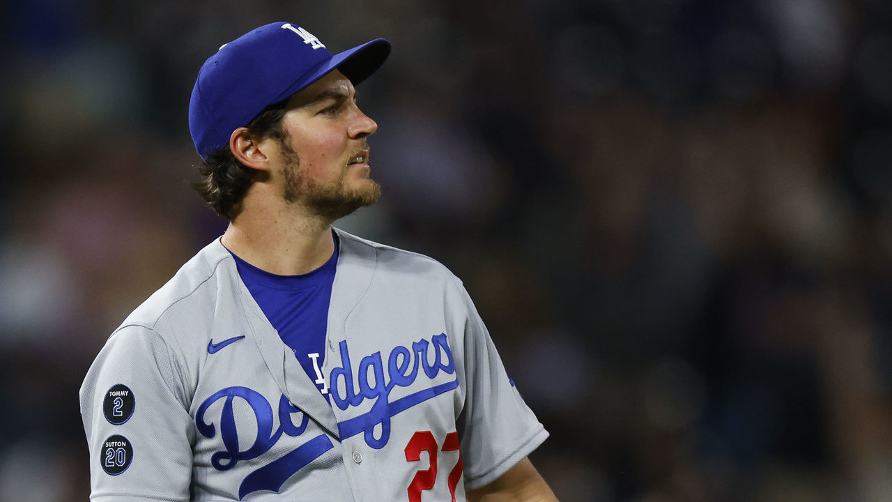 DENVER, CO - APRIL 2: Starting pitcher Trevor Bauer #27 of the Los Angeles Dodgers reacts after giving up a two run home run to Ryan McMahon of the Colorado Rockies during the seventh inning at Coors Field on April 2, 2021 in Denver, Colorado.