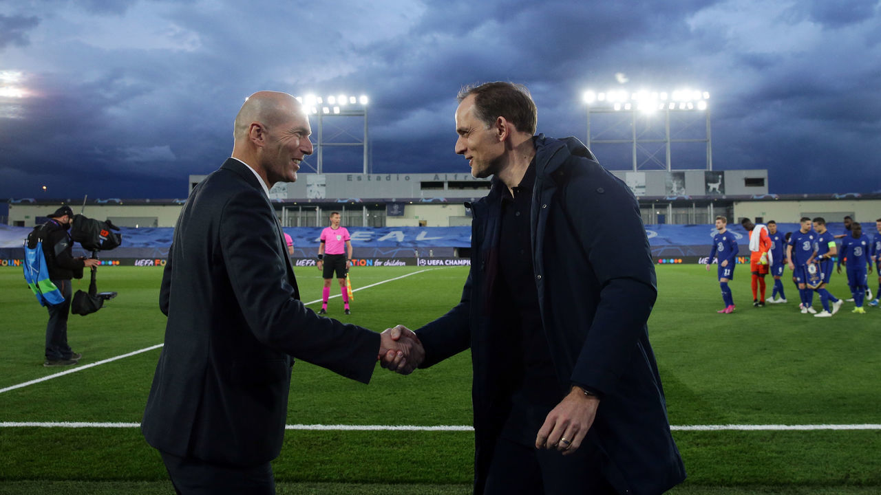 MADRID, SPAIN - APRIL 27: Zinedine Zidane, Head Coach of Real Madrid interacts with Thomas Tuchel, Manager of Chelsea prior to the UEFA Champions League Semi Final First Leg match between Real Madrid and Chelsea FC at Estadio Alfredo Di Stefano on April 27, 2021 in Madrid, Spain. Sporting stadiums around Spain remain under strict restrictions due to the Coronavirus Pandemic as Government social distancing laws prohibit fans inside venues resulting in games being played behind closed doors.