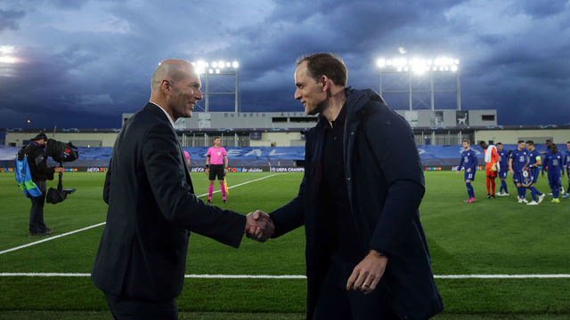 MADRID, SPAIN - APRIL 27: Zinedine Zidane, Head Coach of Real Madrid interacts with Thomas Tuchel, Manager of Chelsea prior to the UEFA Champions League Semi Final First Leg match between Real Madrid and Chelsea FC at Estadio Alfredo Di Stefano on April 27, 2021 in Madrid, Spain. Sporting stadiums around Spain remain under strict restrictions due to the Coronavirus Pandemic as Government social distancing laws prohibit fans inside venues resulting in games being played behind closed doors.