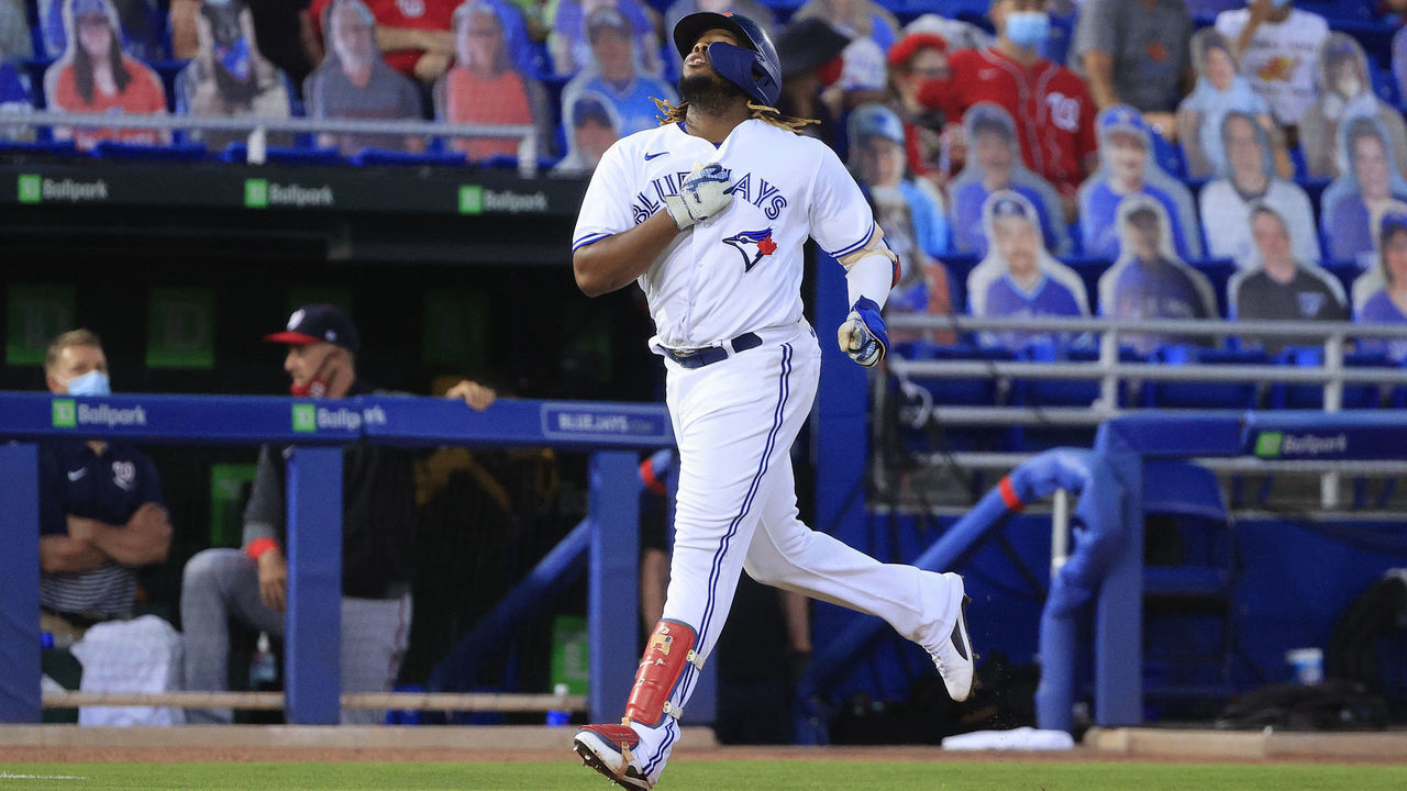 DUNEDIN, FLORIDA - APRIL 27: Vladimir Guerrero Jr. #27 of the Toronto Blue Jays reacts to his a grand-slam home run in the third inning against the Washington Nationals at TD Ballpark on April 27, 2021 in Dunedin, Florida.