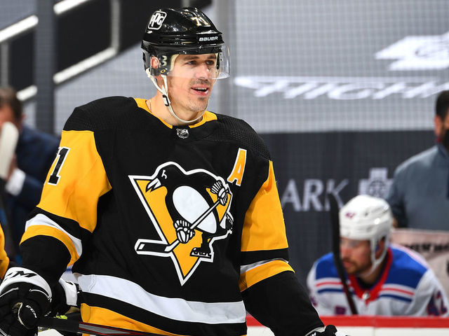PITTSBURGH, PA - MARCH 07: Evgeni Malkin #71 of the Pittsburgh Penguins skates against the New York Rangers at PPG PAINTS Arena on March 7, 2021 in Pittsburgh, Pennsylvania.