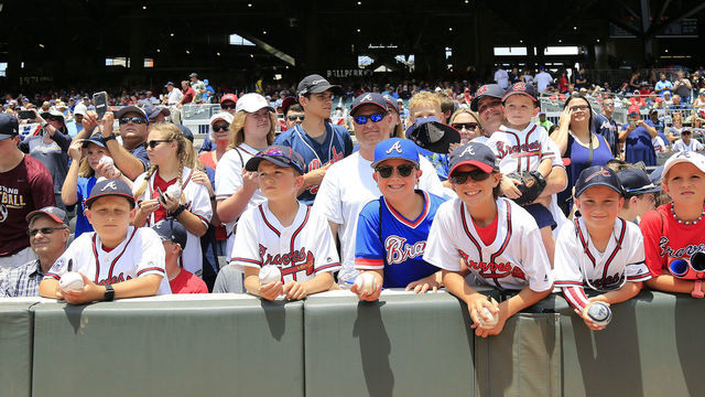 ATLANTA, GA - JUNE 16: Young fans wait for players to autograph their baseballs prior to the MLB game between the Atlanta Braves and the Philadelphia Phillies on June 16, 2019 at SunTrust Park in Atlanta, GA.
