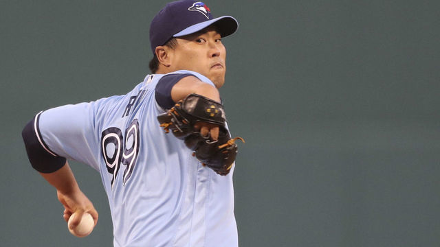BOSTON, MA - APRIL 20: Hyun Jin Ryu #99 of the Toronto Blue Jays pitches sin the first inning of a game against the Boston Red Sox at Fenway Park on April 20, 2021 in Boston, Massachusetts.