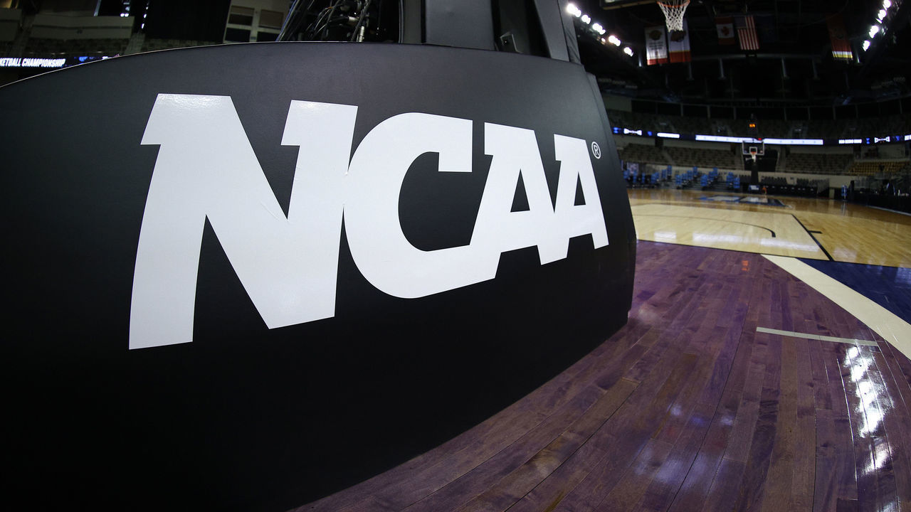 INDIANAPOLIS, INDIANA - MARCH 21: The NCAA logo is seen on the basket stanchion before the game between the Oral Roberts Golden Eagles and the Florida Gators in the second round game of the 2021 NCAA Men's Basketball Tournament at Indiana Farmers Coliseum on March 21, 2021 in Indianapolis, Indiana.
