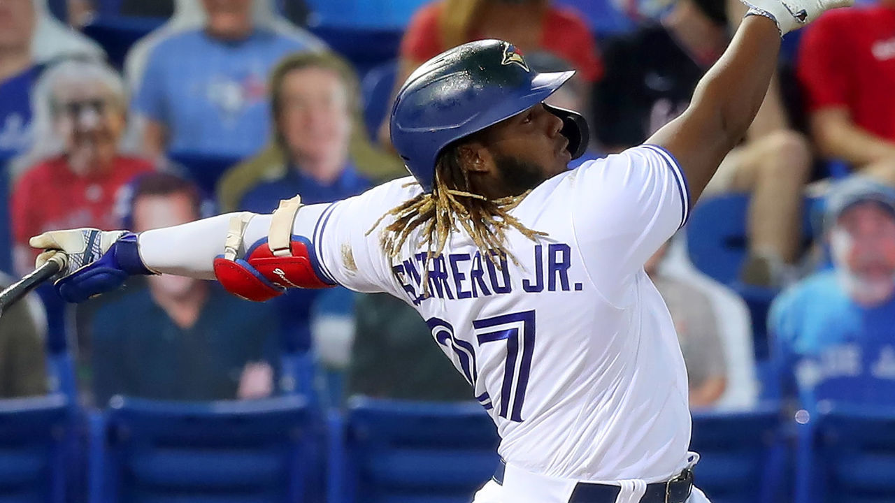 DUNEDIN, FL - APRIL 27: Vladimir Guerrero Jr. (27) of the Blue Jays watches the flight of the ball over the fence for his first of three home runs during the regular season game between the Washington Nationals and the Toronto Blue Jays on April 27, 2021, at TD Ballpark in Dunedin, FL.
