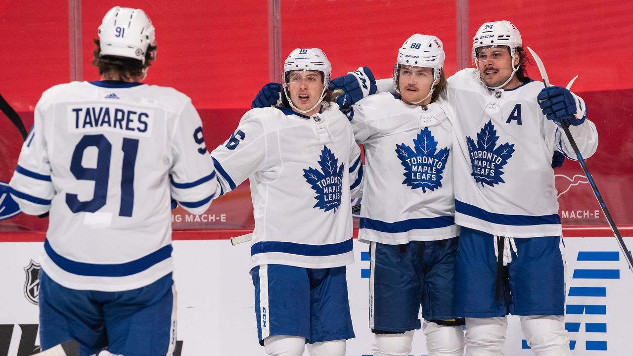MONTREAL, QC - APRIL 28: William Nylander (88) of the Toronto Maple Leafs celebrates with Auston Matthews (34), Mitchell Marner (16) and John Tavares (91) after scoring the 1st goal of the first period of the NHL game between the Toronto Maple Leafs and the Montreal Canadiens on April 28, 2021, at the Bell Centre in Montreal, QC