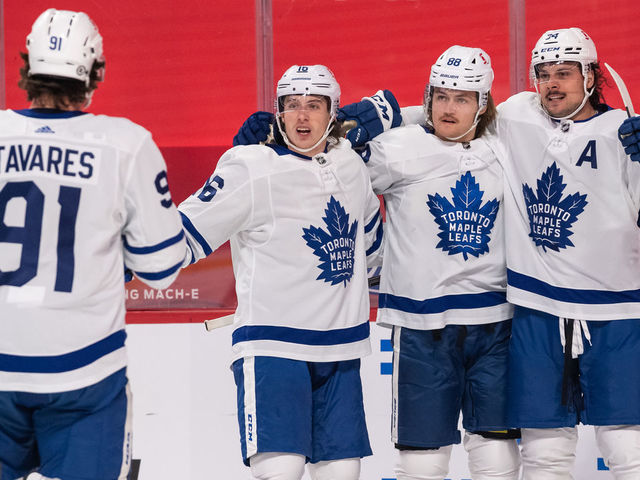 MONTREAL, QC - APRIL 28: William Nylander (88) of the Toronto Maple Leafs celebrates with Auston Matthews (34), Mitchell Marner (16) and John Tavares (91) after scoring the 1st goal of the first period of the NHL game between the Toronto Maple Leafs and the Montreal Canadiens on April 28, 2021, at the Bell Centre in Montreal, QC