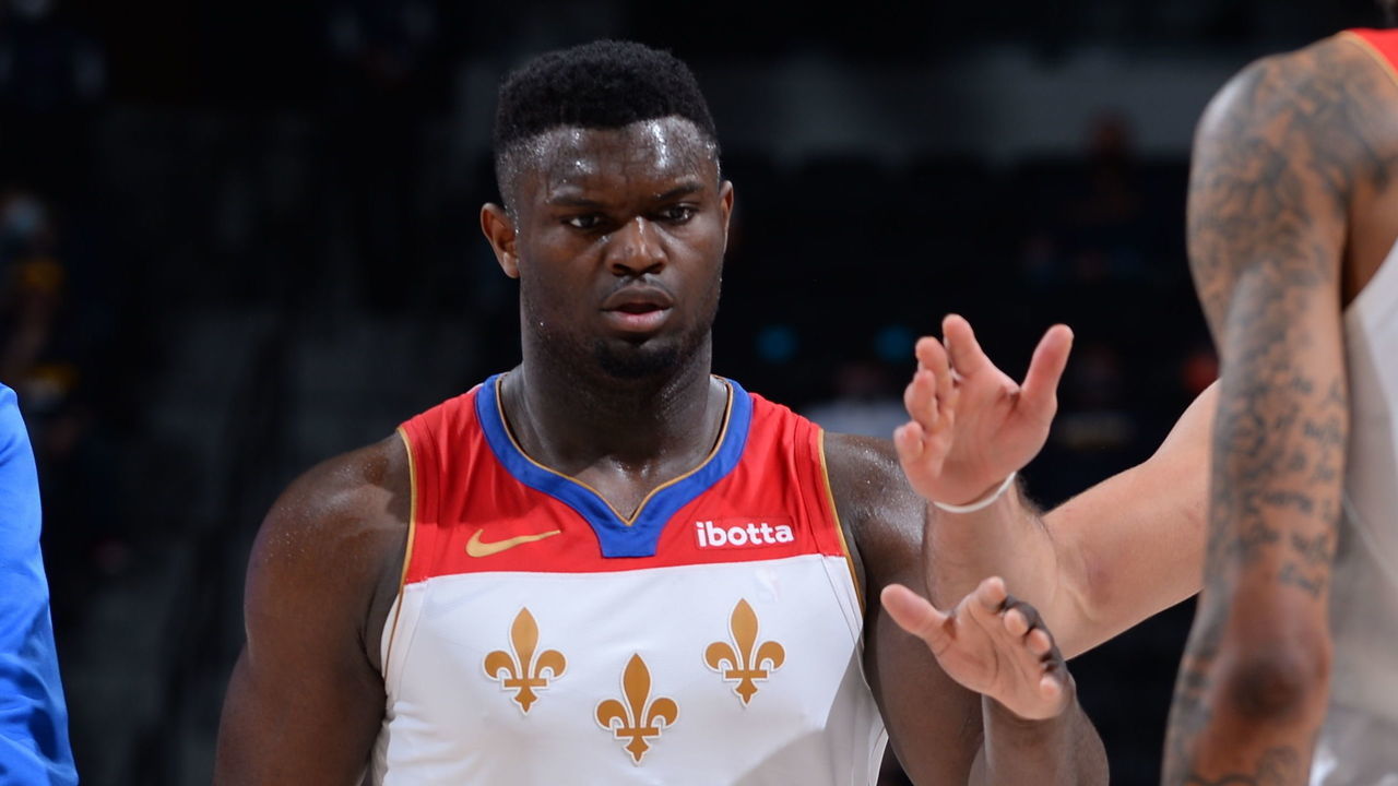 DENVER, CO - APRIL 28: Zion Williamson #1 of the New Orleans Pelicans high-fives teammates during the game against the Denver Nuggets on April 28, 2021 at the Ball Arena in Denver, Colorado. NOTE TO USER: User expressly acknowledges and agrees that, by downloading and/or using this Photograph, user is consenting to the terms and conditions of the Getty Images License Agreement. Mandatory Copyright Notice: Copyright 2021 NBAE