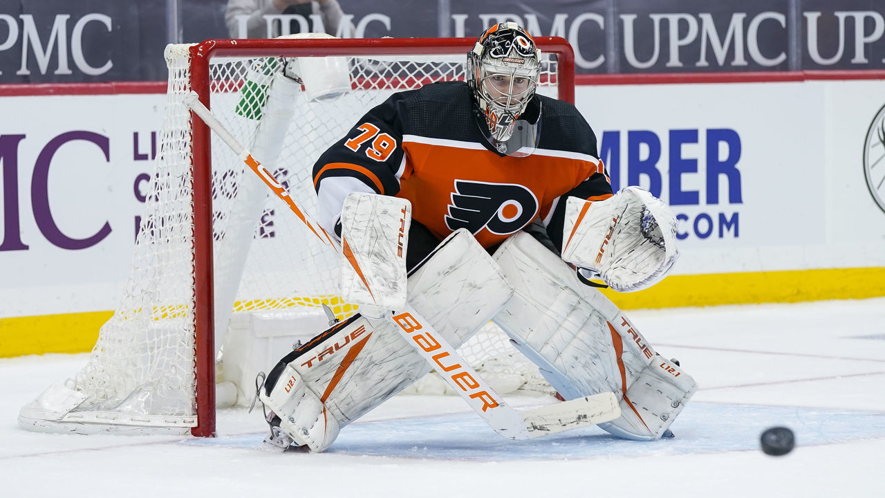 PITTSBURGH, PA - APRIL 15: Philadelphia Flyers Goalie Carter Hart (79) makes a save during the second period in the NHL game between the Pittsburgh Penguins and the Philadelphia Flyers on April 15, 2021, at PPG Paints Arena in Pittsburgh, PA.