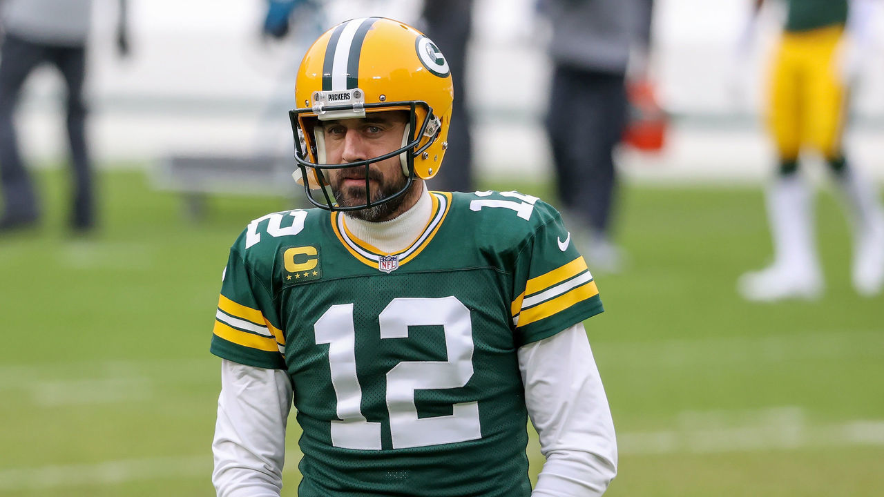 GREEN BAY, WISCONSIN - JANUARY 24: Aaron Rodgers #12 of the Green Bay Packers warms up before the NFC Championship game against the Tampa Bay Buccaneers at Lambeau Field on January 24, 2021 in Green Bay, Wisconsin.